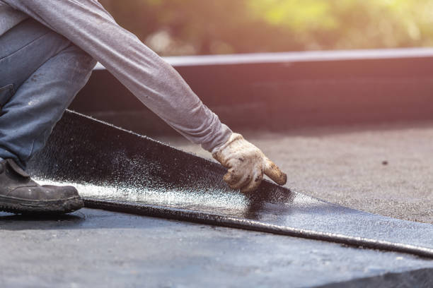 Professional Waterproofing technician working in Wheeler, MI